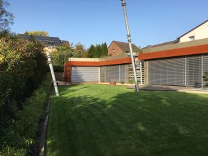 Neugestaltung einer Gartenanlage mit Rollrasenverlegung, Kiesbeeten und Maulwurfschutz, Dirk Prothmann Garten- und Landschaftsbau, Hille